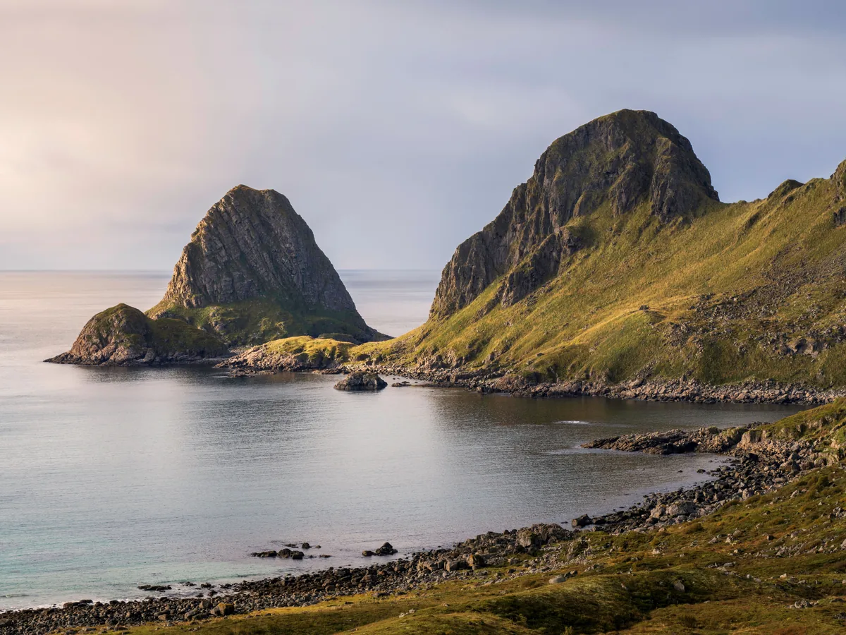 Travellers overlooking a Norwegian landscape